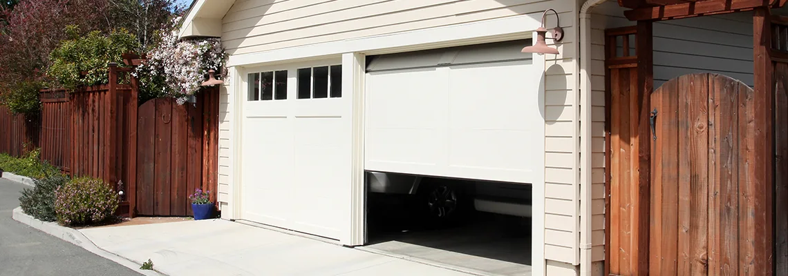 Fix Metal Garage Door Jerking in Wheaton, Illinois